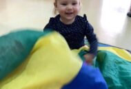 Zabawy Łowców chustą animacyjną